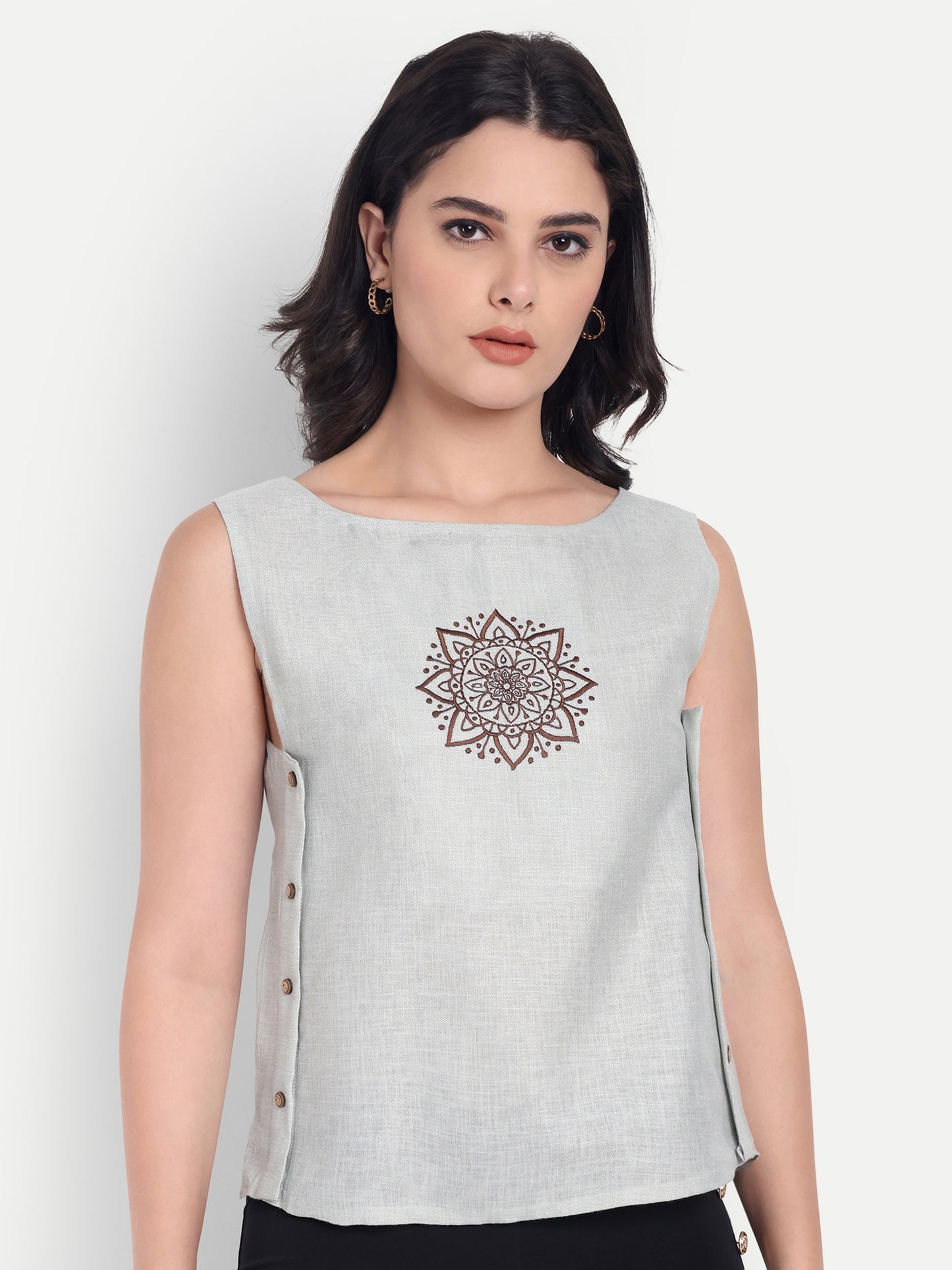 Light green top without sleeves with embroidery - esseneur.