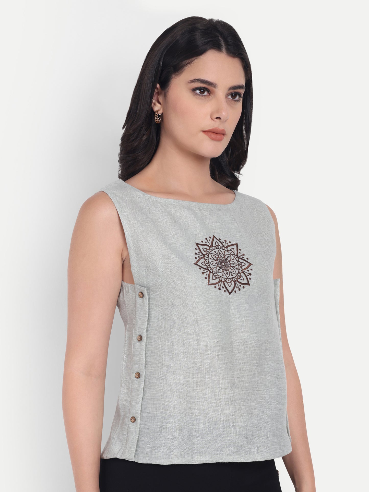 Light green top without sleeves with embroidery - esseneur.