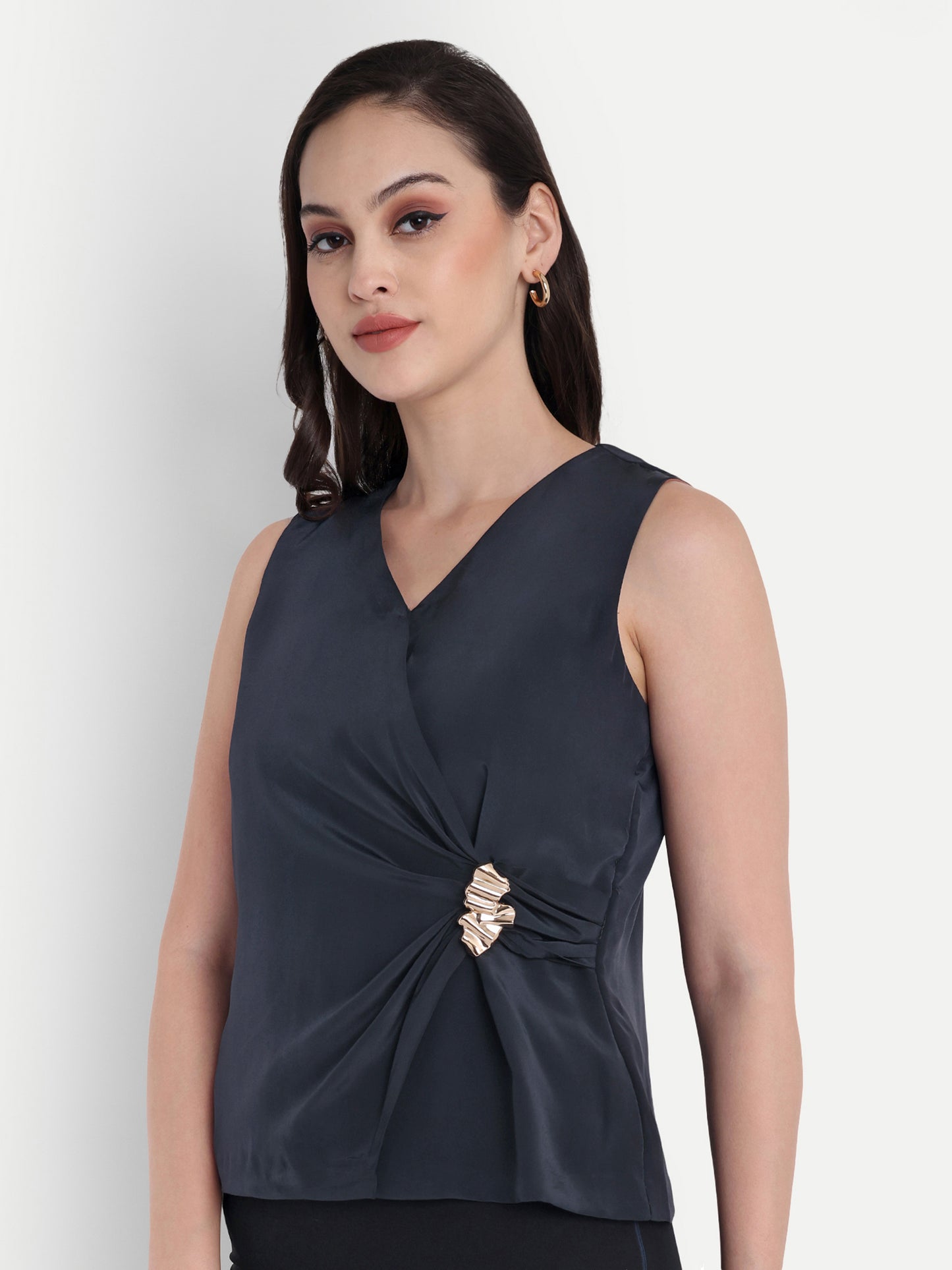Blue top with gold applique on waist - esseneur.