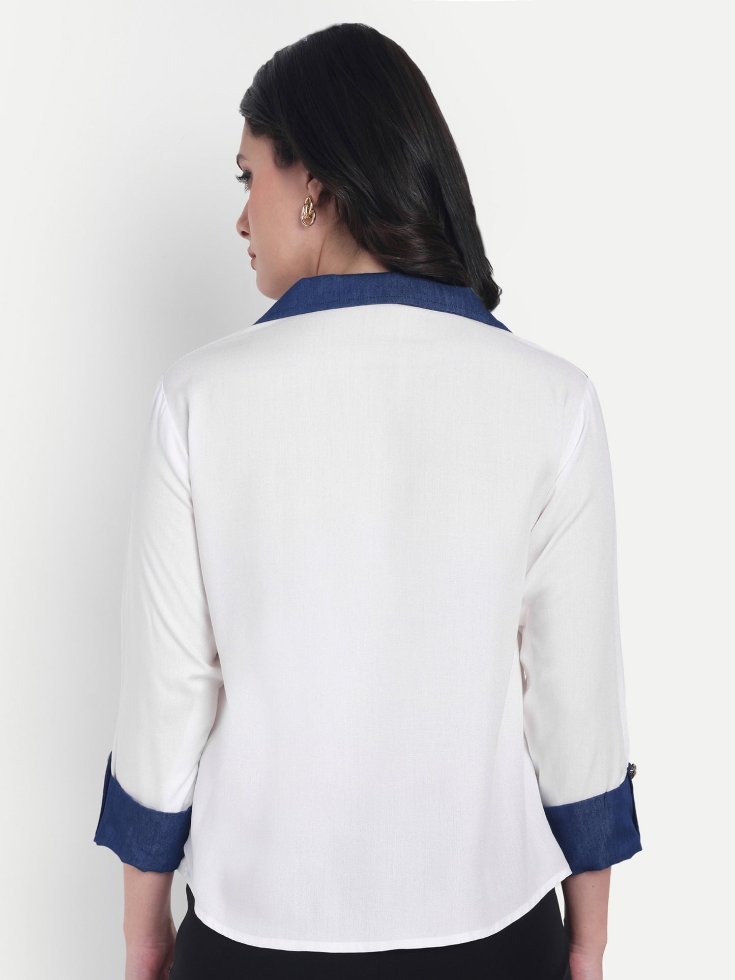 White shirt with dark blue denim on shoulder-esseneur