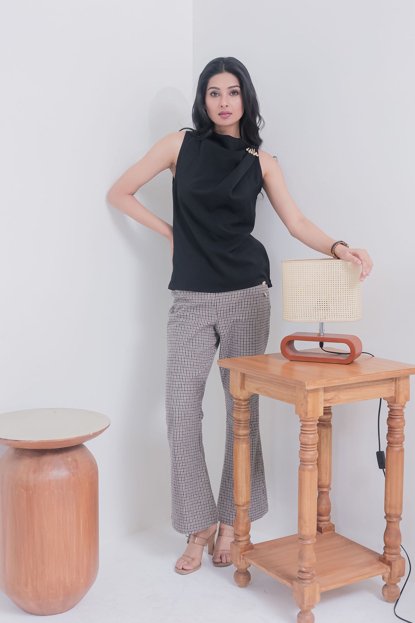 Black sleeveless top with gold applique on shoulder - esseneur.