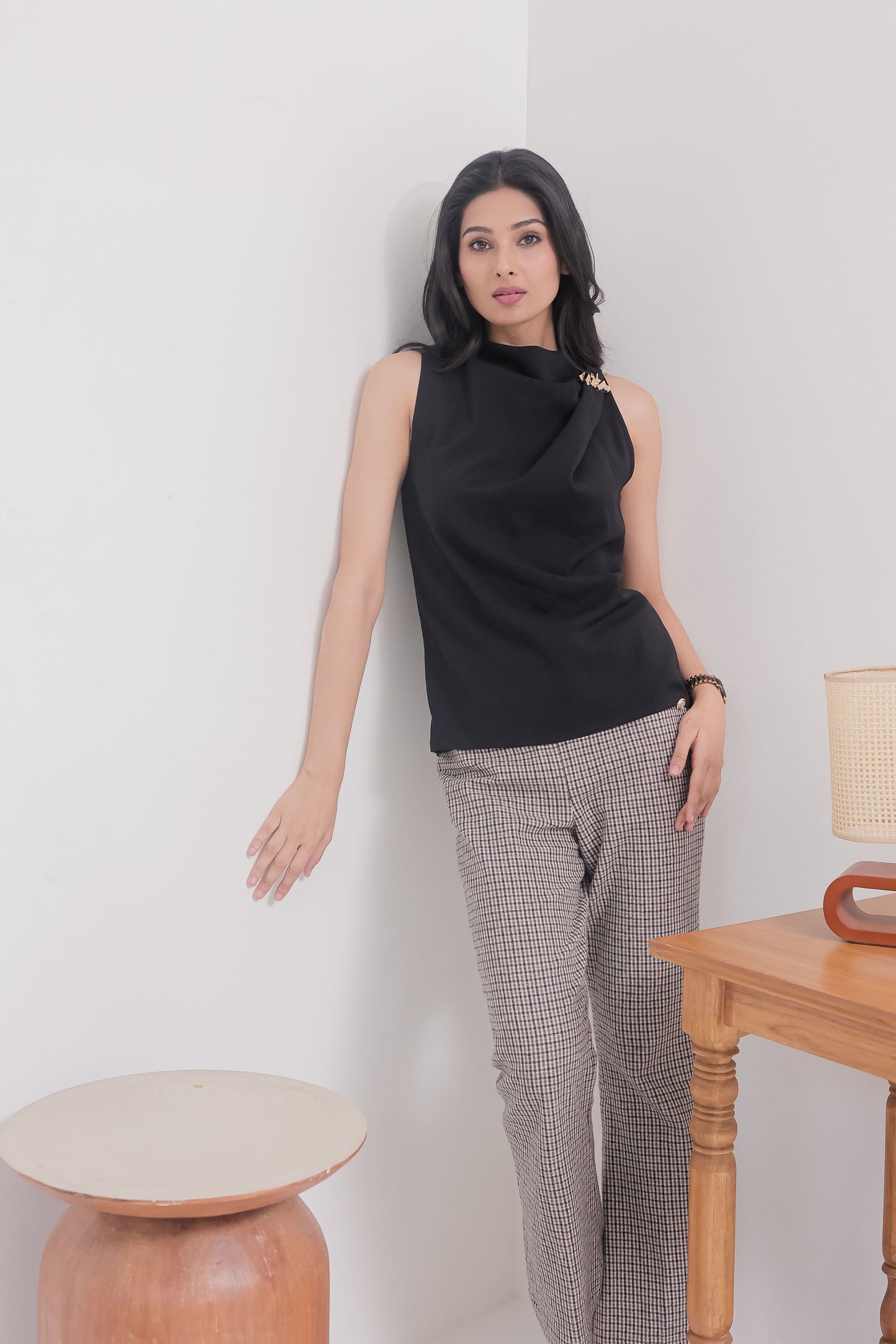 Black sleeveless top with gold applique on shoulder - esseneur.