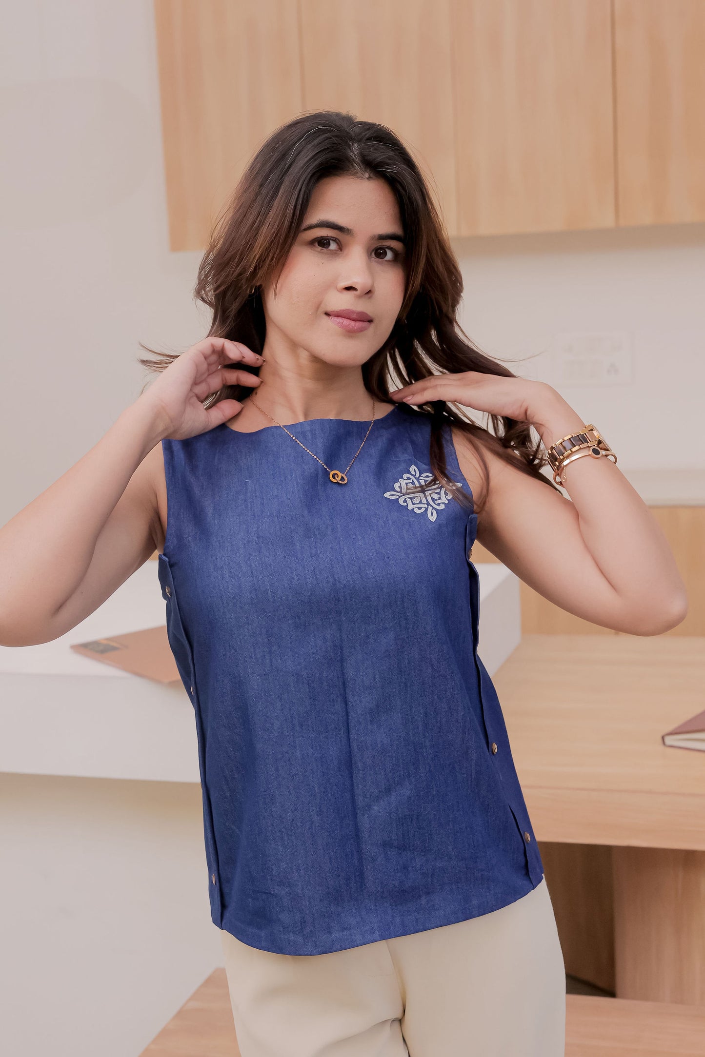 Dark Denim boxy fit sleeveless top with small embroidery at the side - esseneur.