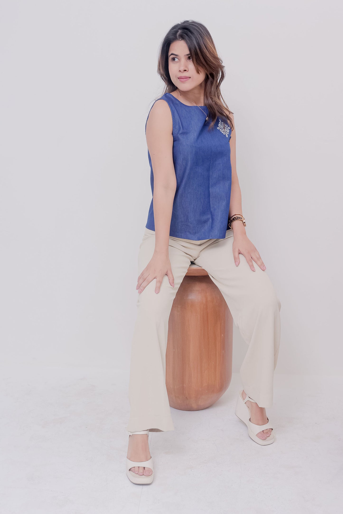 Dark Denim boxy fit sleeveless top with small embroidery at the side - esseneur.