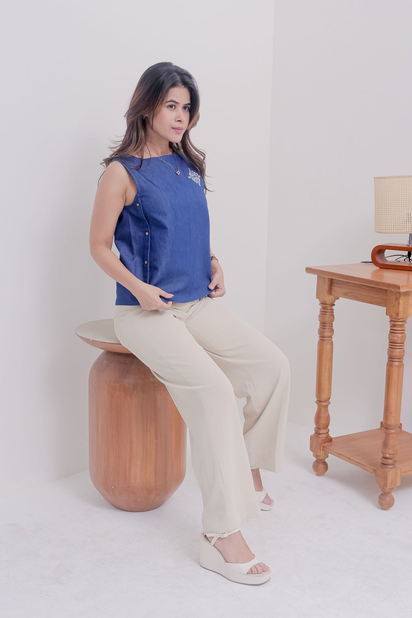 Dark Denim boxy fit sleeveless top with small embroidery at the side - esseneur.