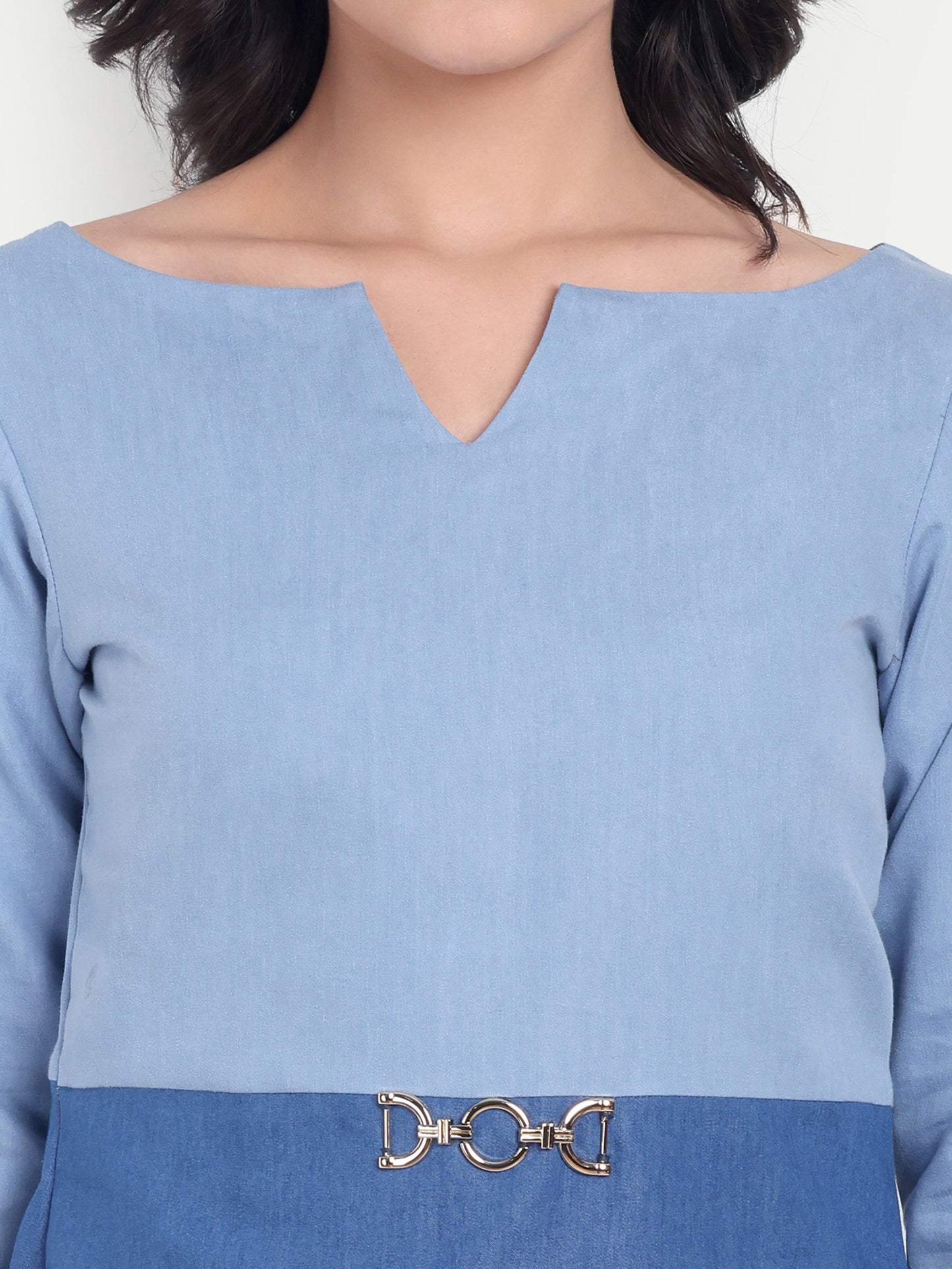 Light blue and dark denim two fabric top with sleeves and gold applique