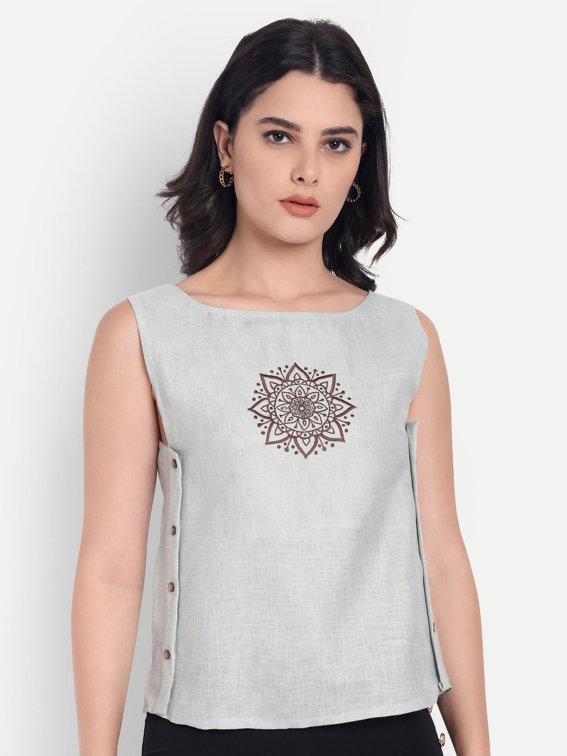 Light green top without sleeves with embroidery - esseneur.
