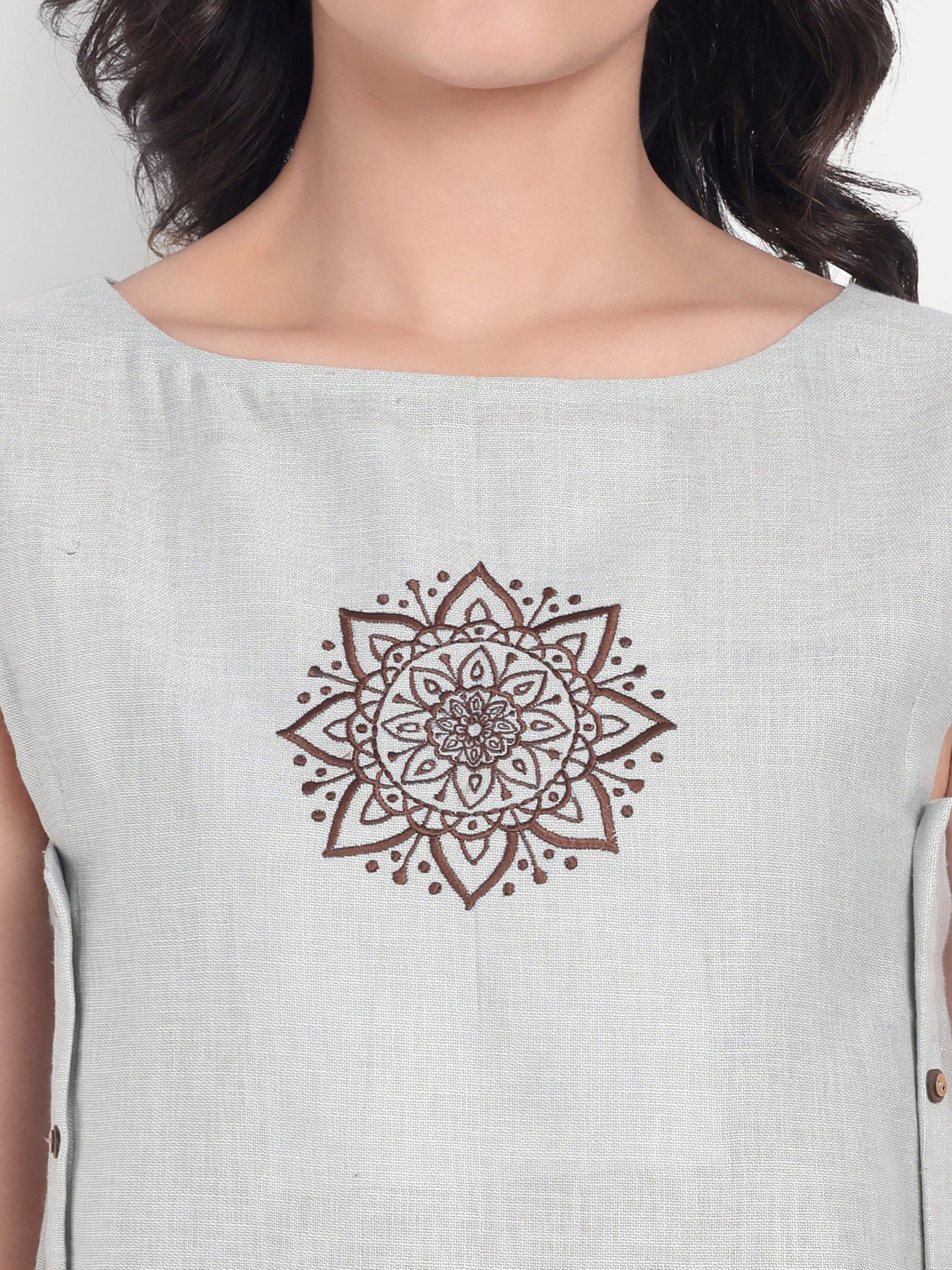 Light green top without sleeves with embroidery - esseneur.