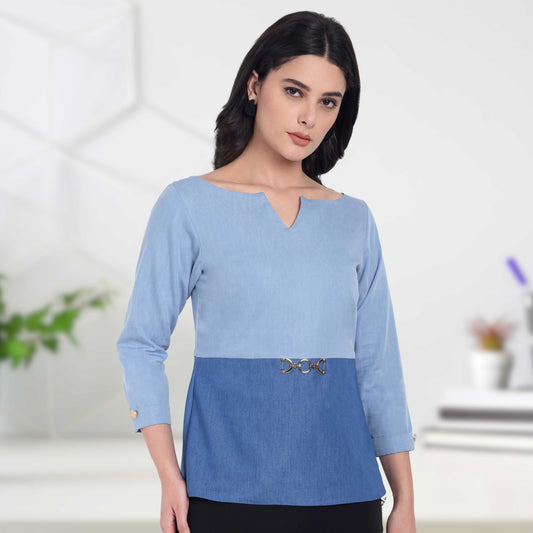 Light blue and dark denim two fabric top with sleeves and gold applique