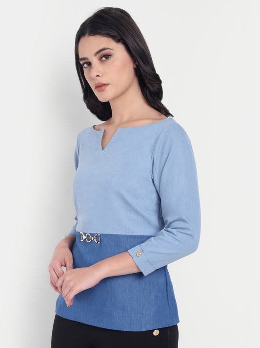 Light blue and dark denim two fabric top with sleeves and gold applique
