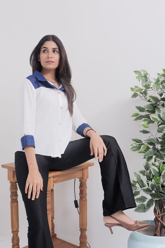 White shirt with dark blue denim on shoulder-esseneur