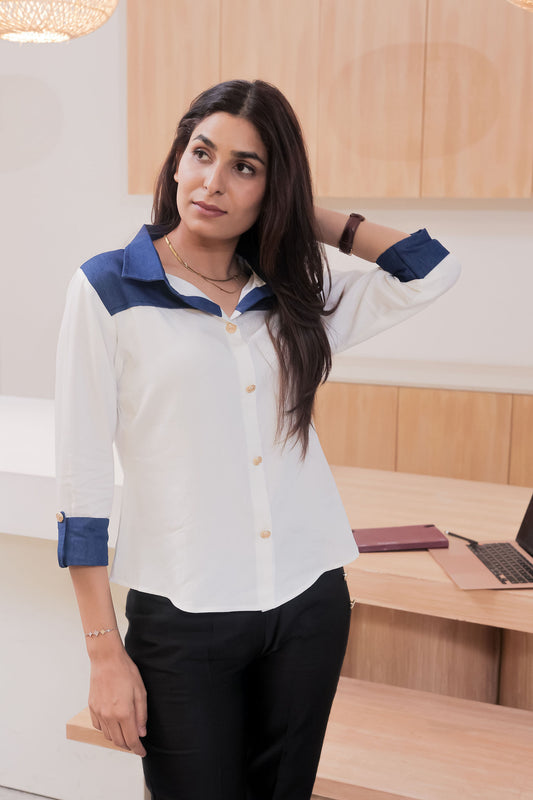 White shirt with dark blue denim on shoulder-esseneur